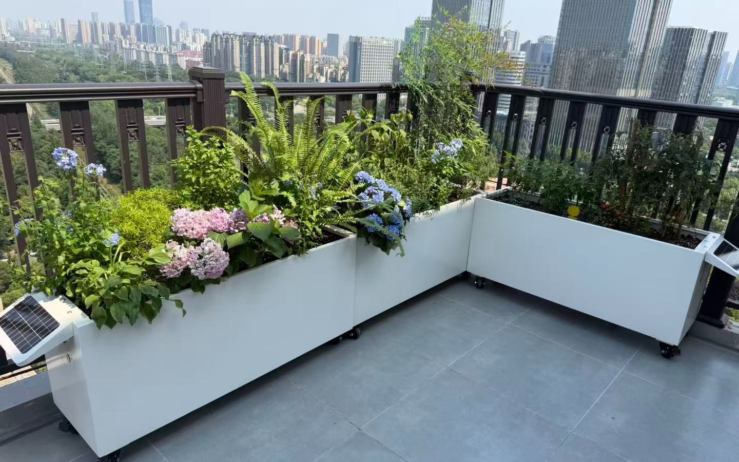 L-shaped smart planters forming a residential rooftop garden